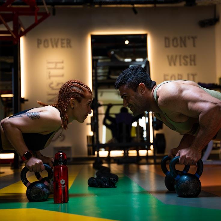 Women in a fitness class doing stretching and mobility exercises